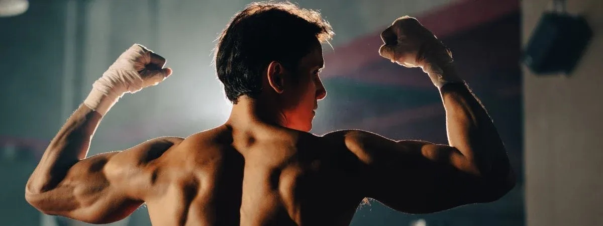 Asian man boxer having strength body